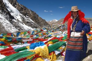 Pilgrim and prayer flags by S Findlay