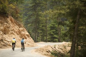 Cycling on part of the newly finished road in Bhutan