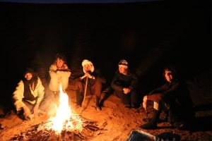 Evening camp fire in the desert